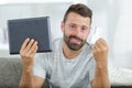 happy man using tablet and credit card Royalty Free Stock Photo