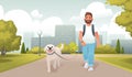 Happy man walks in the city park with his dog. Walking with a pet in nature. Outdoor activities with a four legged friend