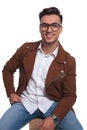 Happy man wearing glasses and leather jacket is smiling Royalty Free Stock Photo