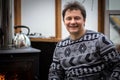 Happy man wearing sweater portrait indoor