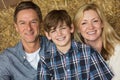 Happy Man Woman Boy Child Family on Hay Bales Royalty Free Stock Photo