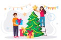 Happy man and woman decorates a Christmas tree Royalty Free Stock Photo