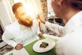 Happy man and woman have lunch in a restaurant Royalty Free Stock Photo