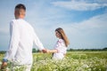 Happy man and woman in love enjoy spring weather. happy relations. girl and guy in field. bride and groom. romantic Royalty Free Stock Photo