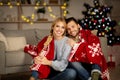 Happy man and woman posing at home on xmas eve Royalty Free Stock Photo