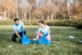 Volunteers cleaning public park from the rubbish