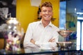 Happy man working as barman smiling in bar Royalty Free Stock Photo