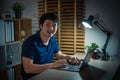 happy man working with laptop at night Royalty Free Stock Photo