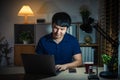 happy man working with laptop at night Royalty Free Stock Photo