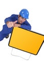 Man with yellow road sign Royalty Free Stock Photo