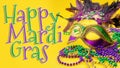 Happy Mardi Gras and Fat Tuesday carnival concept theme with close up on a face mask full of color, feathers and texture and Royalty Free Stock Photo