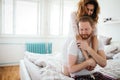 Happy married couple being romantic and sensual in bed Royalty Free Stock Photo