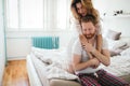 Happy married couple being romantic and sensual in bed Royalty Free Stock Photo
