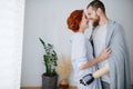 Happy married couple in love at home, standing close, feeling each other Royalty Free Stock Photo