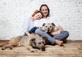 A happy married couple with their dogs, a seed portrait, love, c