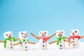 Happy Marshmallow Family Play in Snow. Funny Festive Christmas Card