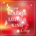 Happy Martin Luther King Day free typography greeting card with red bokeh background.