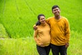 Happy maternity couple in countryside landscape Royalty Free Stock Photo
