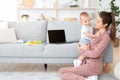 Happy Maternity Leave. Cheerful Mom Enjoying Spending Time With Baby At home Royalty Free Stock Photo