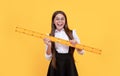happy mathematics. tween girl hold ruler. back to school. algebra and geometry. Royalty Free Stock Photo