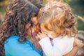 Happy mather and daughter in summer