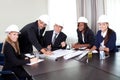 Happy mature architects in a meeting at the office Royalty Free Stock Photo