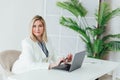 Happy mature business woman entrepreneur in office using laptop at work, smiling professional middle aged 40 years old Royalty Free Stock Photo