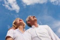 Happy mature couple looking to the blue sky Royalty Free Stock Photo