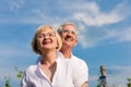 Happy mature couple looking to the blue sky Royalty Free Stock Photo