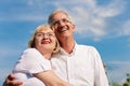 Happy mature couple looking to the blue sky Royalty Free Stock Photo