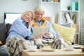 Happy Mature Couple Reading Book Royalty Free Stock Photo