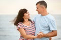 Happy mature couple spending time  on sea beach Royalty Free Stock Photo