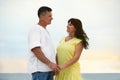 Happy mature couple spending time together on sea beach Royalty Free Stock Photo