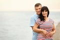 Happy mature couple spending time together onbeach. Space for text Royalty Free Stock Photo