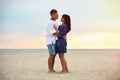 Happy mature couple spending time together on sea beach Royalty Free Stock Photo