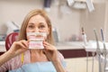 Cheerful woman having dental checkup