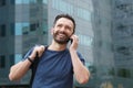 Happy mature guy talking on cell phone Royalty Free Stock Photo