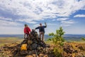 happy mature married couple traveling through the Ural mountains