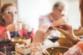 Happy mature people eating at restaurant lunch - Senior friends having fun eating and drinking red wine - Joyful elderly lifestyle Royalty Free Stock Photo