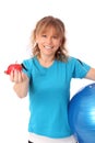 Happy mature woman in blue workout clothes feeling great Royalty Free Stock Photo