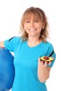 Happy mature woman in blue workout clothes feeling great Royalty Free Stock Photo