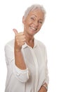 Happy mature woman giving thumbs up Royalty Free Stock Photo