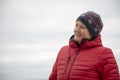 Happy mature woman outdoors on a cold day Royalty Free Stock Photo