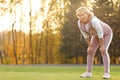 Happy mature woman resting after exercise Royalty Free Stock Photo