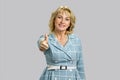 Happy mature woman showing thumb up. Royalty Free Stock Photo