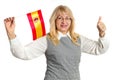 Happy mature woman with Spain flag showing thumb up Royalty Free Stock Photo