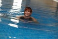 Happy mature woman in swimming pool Royalty Free Stock Photo