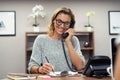 Happy mature woman talking on phone Royalty Free Stock Photo