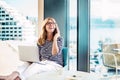 Happy mature woman working from home Royalty Free Stock Photo