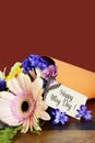 Happy May Day traditional gift of Spring Flowers. Royalty Free Stock Photo